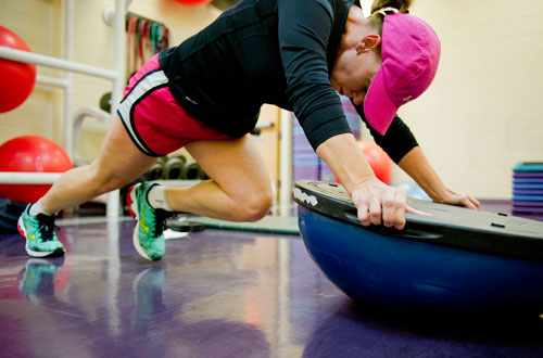 Renee Reddic performs exercises during a personal training class at the Robert D. Fowler YMCA in Peachtree Corners on Thursday, December 13, 2012. 