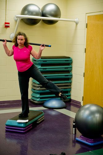 Francoise Lama-Solet performs exercises during a personal training class at the Robert D. Fowler YMCA in Peachtree Corners on Thursday, December 13, 2012. 
