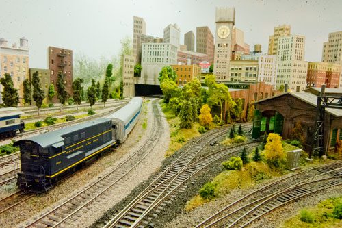 Model trains leave the city of Baltimore in George Bloodworth's layout at his home in Alpharetta on Sunday, January 6, 2013.
