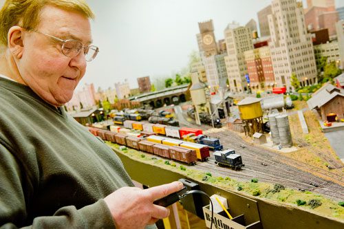 George Bloodworth operates his model trains at his home in Alpharetta on Sunday, January 6, 2013. 