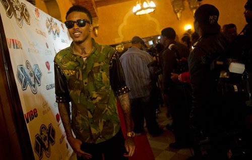 August Alsina (left) walks the red carpet before the So So Def 20th Anniversary Concert at the Fox Theatre in Atlanta on Saturday, February 23, 2013.  