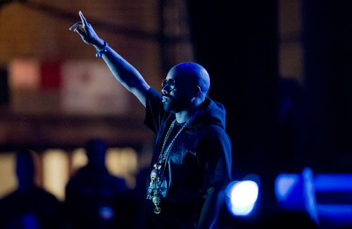 Jermaine Dupri walks onto the stage at the Fox Theatre in Atlanta at the start of the So So Def 20th Anniversary Concert on Saturday, February 23, 2013. 