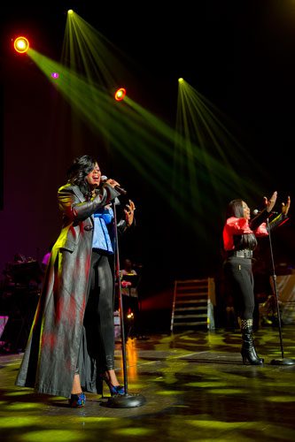 Tamika Scott (left) and her sister LaTocha from the group Xscape perform on stage at the Fox Theatre in Atlanta during the So So Def 20th Anniversary Concert on Saturday, February 23, 2013. 