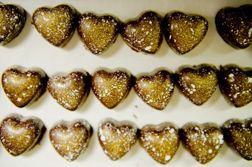 Heart shaped truffles sit on a bakers rack at Cacao Atlanta in Inman Park on Friday, February 1, 2013.