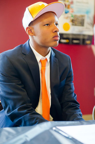 Joshua Dobbs waits to sign his commitment paper to Tennessee during the National Signing Day event at Alpharetta High School in Alpharetta, Georgia on Wednesday, February 6, 2013. Dobbs started as quarterback for Alpharetta for the past two years and has officially signed to play for Tennessee.