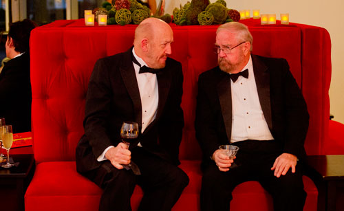 Wendell Davidson (left) and Bradford Clark socialize during the third annual Symphony Gala at the Woodruff Arts Center in Atlanta on Saturday, March 2, 2013.
