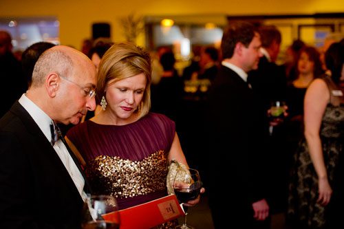  Frank Buonanotte (left) talks with Jenn Weyand during the third annual Symphony Gala at the Woodruff Arts Center in Atlanta on Saturday, March 2, 2013.