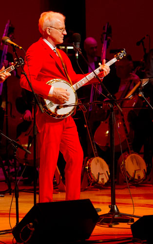 Steve Martin plays on stage at Atlanta Symphony Hall with the Steep Canyon Rangers during the third annual Symphony Gala on Saturday, March 2, 2013. 