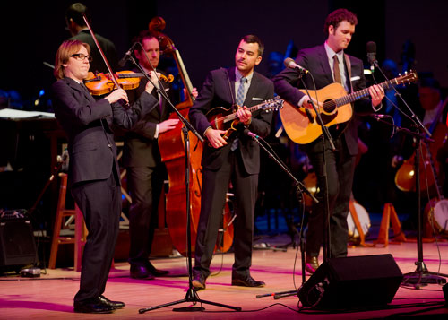 Steep Canyon Rangers' fiddle player Nicky Sanders (left) plays with the band on stage at Atlanta Symphony Hall in Atlanta during the third annual Symphony Gala on Saturday, March 2, 2013. 