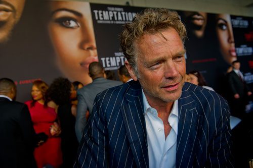 John Schneider walks the red carpet for Tyler Perry's new movie Temptation at the AMC Parkway Pointe 15 theaters in Atlanta on Saturday, March 16, 2013.