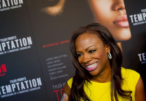 Kandi Burruss walks the red carpet for Tyler Perry's new movie Temptation at the AMC Parkway Pointe 15 theaters in Atlanta on Saturday, March 16, 2013. 