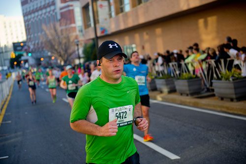 Michael Bardell (5472) nears the final turn before the finish line during the 2013 Publix Georgia Marathon/Half Marathon in Atlanta on Sunday, March 17, 2013. 