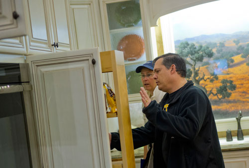 Brian Williams (right) and his wife Brenda look at a cabinet display during the 35th Annual Spring Atlanta Home Show at the Cobb Galleria Center in Atlanta on Saturday, March 23, 2013.