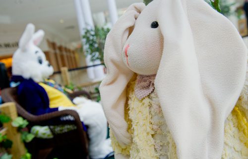 Stuffed bunnies surround the Easter Bunny at North Point Mall in Alpharetta on Thursday, March 21, 2013.
