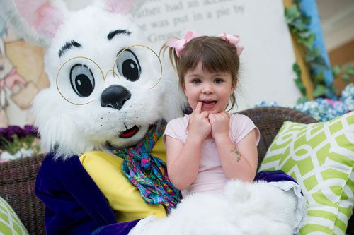 Emerson McHale poses for a photo with the Easter Bunny at North Point Mall in Alpharetta on Thursday, March 21, 2013.