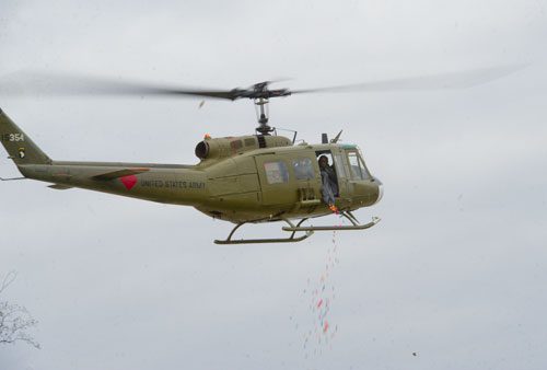 An Army helicopter drops close to 2,000 eggs onto the field at Nash Farm Battlefield in Hampton before the start of the Easter Egg Hunt on Friday, March 22, 2013.