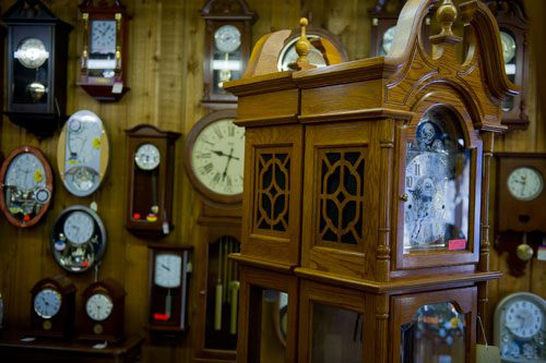 Clocks of all shapes and sizes keep time at Champ's Clock Shop in Douglasville on Saturday, March 9, 2013.