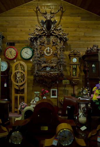 Clocks of all shapes and sizes keep time at Champ's Clock Shop in Douglasville on Saturday, March 9, 2013.