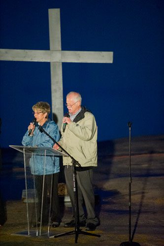 Deb Cole (left) and her husband Ron sing a hymn during the 69th annual Easter Sunrise Service on top of Stone Mountain at Stone Mountain Park on Sunday, March 31, 2013. 