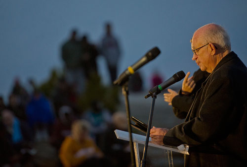 Mel Buck of Annistown Road Baptist Church reads a passage of scripture during the 69th annual Easter Sunrise Service on top of Stone Mountain at Stone Mountain Park on Sunday, March 31, 2013. 