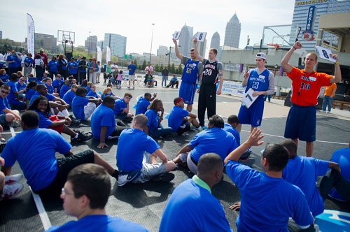 Colton Overway (right), Joseph Henain, Jakob Gollon and Kevin Kotzur work as coaches during the Allstate NABC Good Works Team Basketball Clinic at Atlantic Station in Atlanta on Sunday, April 7, 2013. 