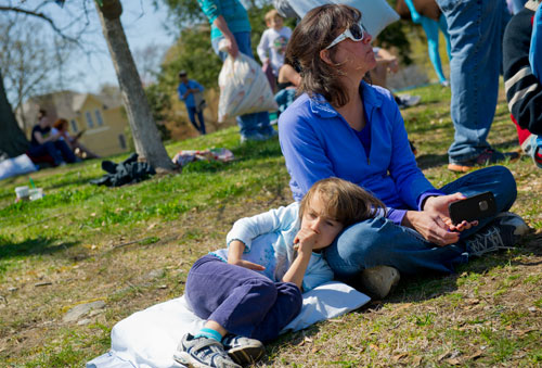 Anabel Gonzalez takes a break from the pillow fight at Freedom Park in Little Five Points on Saturday, April 6, 2013.