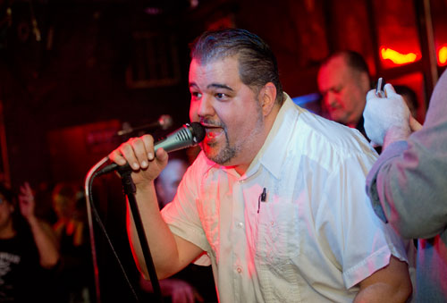 Carlos Capote, lead singer for the Breeze Kings, performs on stage at the Northside Tavern in Atlanta on Saturday, April 6, 2013.