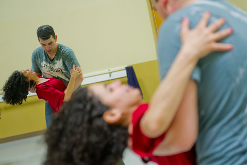 Marise Teixeira (left) is dipped by Joel DeSalvo as they practice a new dance step during a Dance 4 Fun swing class in Lawrenceville on Monday, April 15, 2013. 