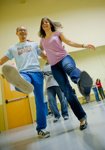 Taeook Kwon (left) and Kim Dyckman practice a new dance step during a Dance 4 Fun swing class in Lawrenceville on Monday, April 15, 2013.