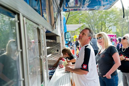 The first ever Alpharetta Food Truck Alley event on Old Roswell St. in the historic downtown section of the city on Thursday, April 18, 2013.