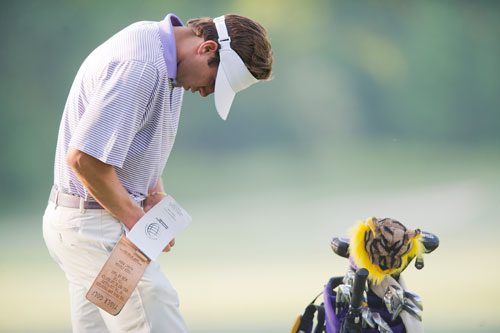 LSU's Curtis Thompson records his score at the Capital City Club's Crabapple Course in Milton, Georgia for the first round of the NCAA Mens Golf Championship Tournament on Tuesday, May 28, 2013.