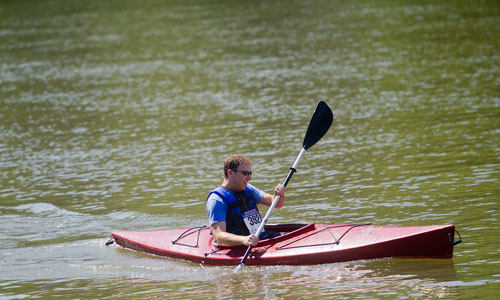 Brendan BassMarra paddles his kayak during the Back to the Chattahoochee River Race & Festival in Roswell on Saturday, June 15, 2013. 