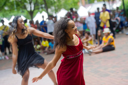 Paige White (right) and Chardonnay Morgan perform during the Cobb NAACP Juneteenth Celebration in Marietta Square on Saturday, June 15, 2013. 