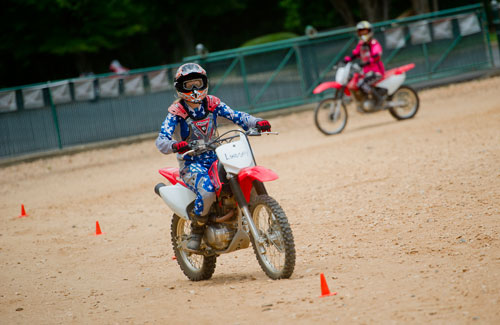 Students learn the proper way to handle a dirt bike safely during a class at the Motorcycle Safety Foundation campus in Alpharetta on Thursday, June 27, 2013.