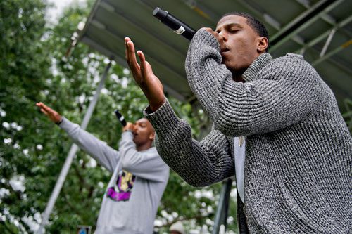 Jai Yung (right) and Mishon Ratliff perform on stage during the Atlanta Street Food Festival at Piedmont Park on Saturday, July 13, 2013. 