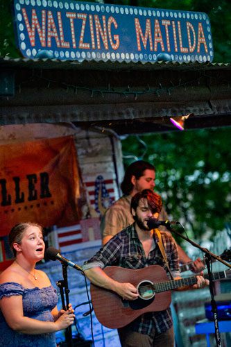 Tiffany Blalock (left), Jason Waller and Zac Caplan of the band Waller perform on stage at Matilda's Under the Pines in Alpharetta on Saturday, July 13, 2013.
