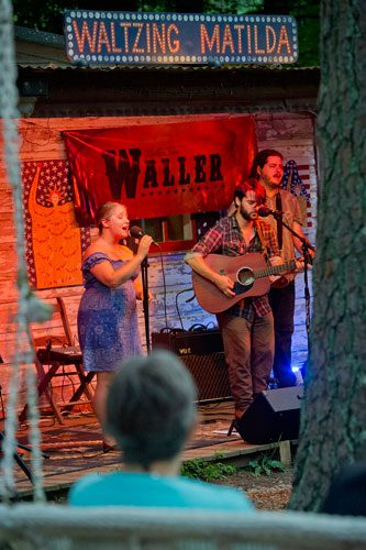 Tiffany Blalock (left), Jason Waller and Zac Caplan of the band Waller perform on stage at Matilda's Under the Pines in Alpharetta on Saturday, July 13, 2013.