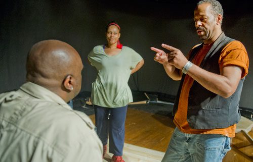 Director Thomas W. Jones II (right) works with Minka Wiltz and Brad Raymond on a scene during rehearsal at Horizon Theatre in the Little Five Points neighborhood of Atlanta on Wednesday, June 26, 2013.