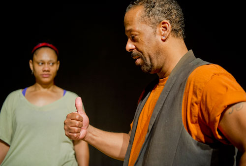 Director Thomas W. Jones II (right) gives a final thumbs up after working with Minka Wiltz on a scene during rehearsal at Horizon Theatre in the Little Five Points neighborhood of Atlanta on Wednesday, June 26, 2013. 