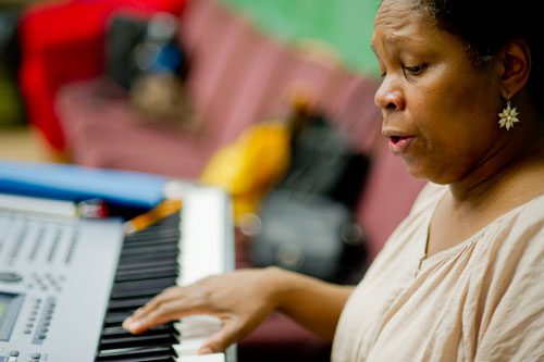 Music director and composer Renee Clark plays a selection of music during rehearsal for "Every Tongue Confess" at Horizon Theatre in the Little Five Points neighborhood of Atlanta on Wednesday, June 26, 2013.