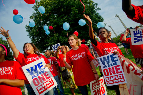 Nia James (left), Hannah Ontiveros and Aimee Twagirumukiza release balloons as part of the We Are Here Rally for Respect in Rememberance of Teresa Weaver Pickard at Piedmont Park in Atlanta on Wednesday, June 26, 2013. 