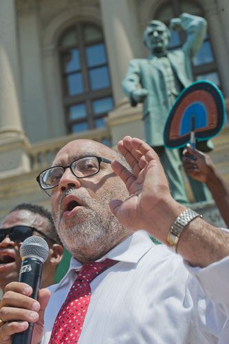 Senator Vincent D. Fort (center) speaks during the Trayvon Martin Rally at the Georgia State Capitol in Atlanta on Sunday, July 28, 2013.