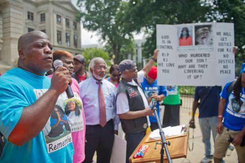 Kenneth Johnson (left) and his wife Jacquelyn speak about their son Kendrick's death during the Trayvon Martin Rally at the Georgia State Capitol in Atlanta on Sunday, July 28, 2013. 