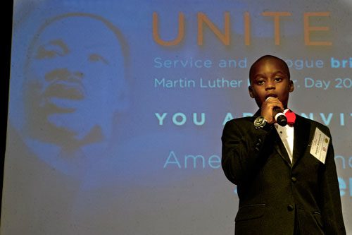 Zaqary Asuamah recites Dr. Martin Luther King Jr.'s famous I Have a Dream speech during America's Sunday Supper at the Carter Center in Atlanta on Sunday, August 11, 2013. 