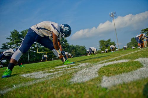 Cedar Grove's Labron Morris stretches before their game against Columbia at Panthersville Stadium in Decatur on Friday, August 30, 2013.