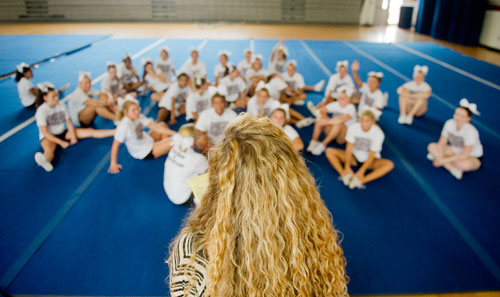 Northgate cheerleading coach Sarah Frazier (center) talks with her athletes before the start of practice on Tuesday, August 20, 2013.