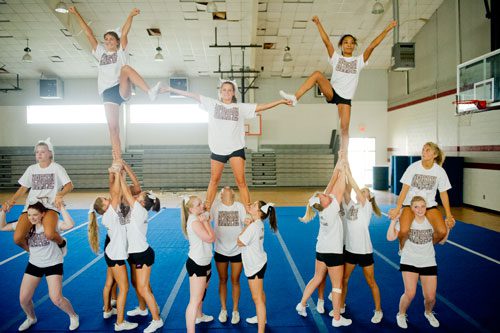 The varsity cheerleading squad at Northgate High School in Newnan practice their routine on Tuesday, August 20, 2013.