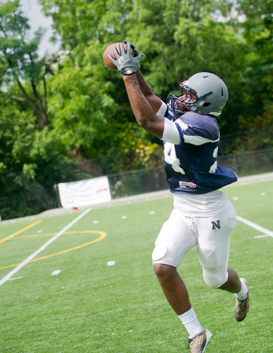 Norcross' Chris Herndon reaches out to snag the ball during practice on Wednesday, August 21, 2013. 
