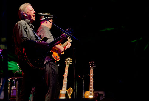 Boz Scaggs (left) performs on stage with guitarist Drew Zingg during the Wells Fargo Concerts in the Garden Series at the Atlanta Botanical Gardens on Friday, July 19, 2013.