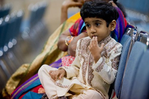 Manomay Devabhaktuni waits for his turn to go on stage during the 17th annual Festival of India at the Gwinnett Center in Duluth on Saturday, August 24, 2013. 